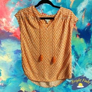 Peach sleeveless blouse